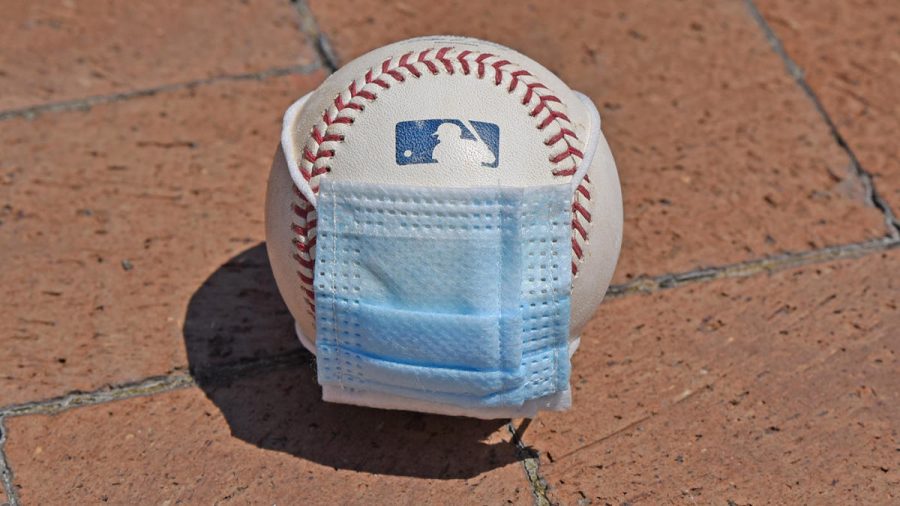 DETROIT, MI - JULY 01:  A detailed view of an official Major League Baseball with a surgical mask placed on it sitting outdie of Comerica Park on July 1, 2020 in Detroit, Michigan.  (Photo by Mark Cunningham/MLB Photos via Getty Images)