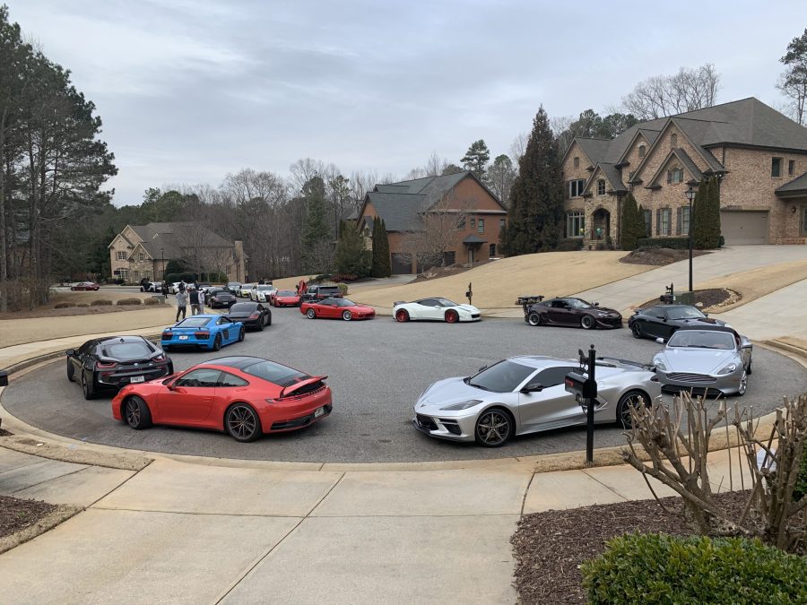 Birthday Supercars for Kids lined up outside a house in Alpharetta, GA.