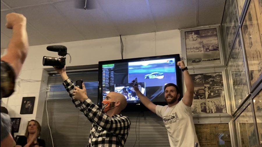 Michael Garrett and NBC cameraman right after Chase Elliot won the Cup Series Championship (Photo by Anna Kate Clark)