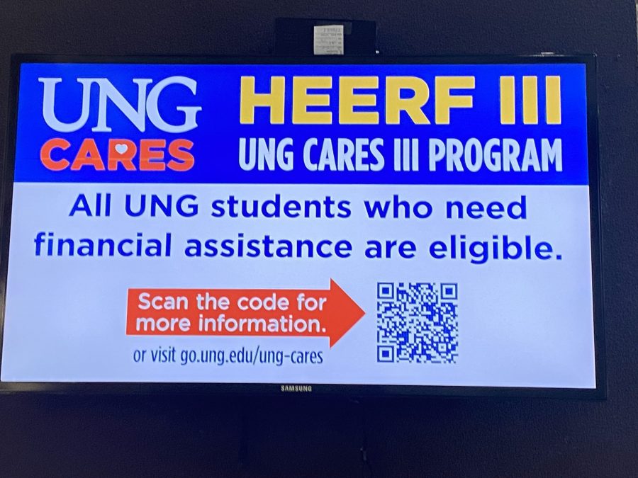 Figure 1: Information about HEERF III on a TV near the post office in HOAG. Photo by: Ashley Brehm