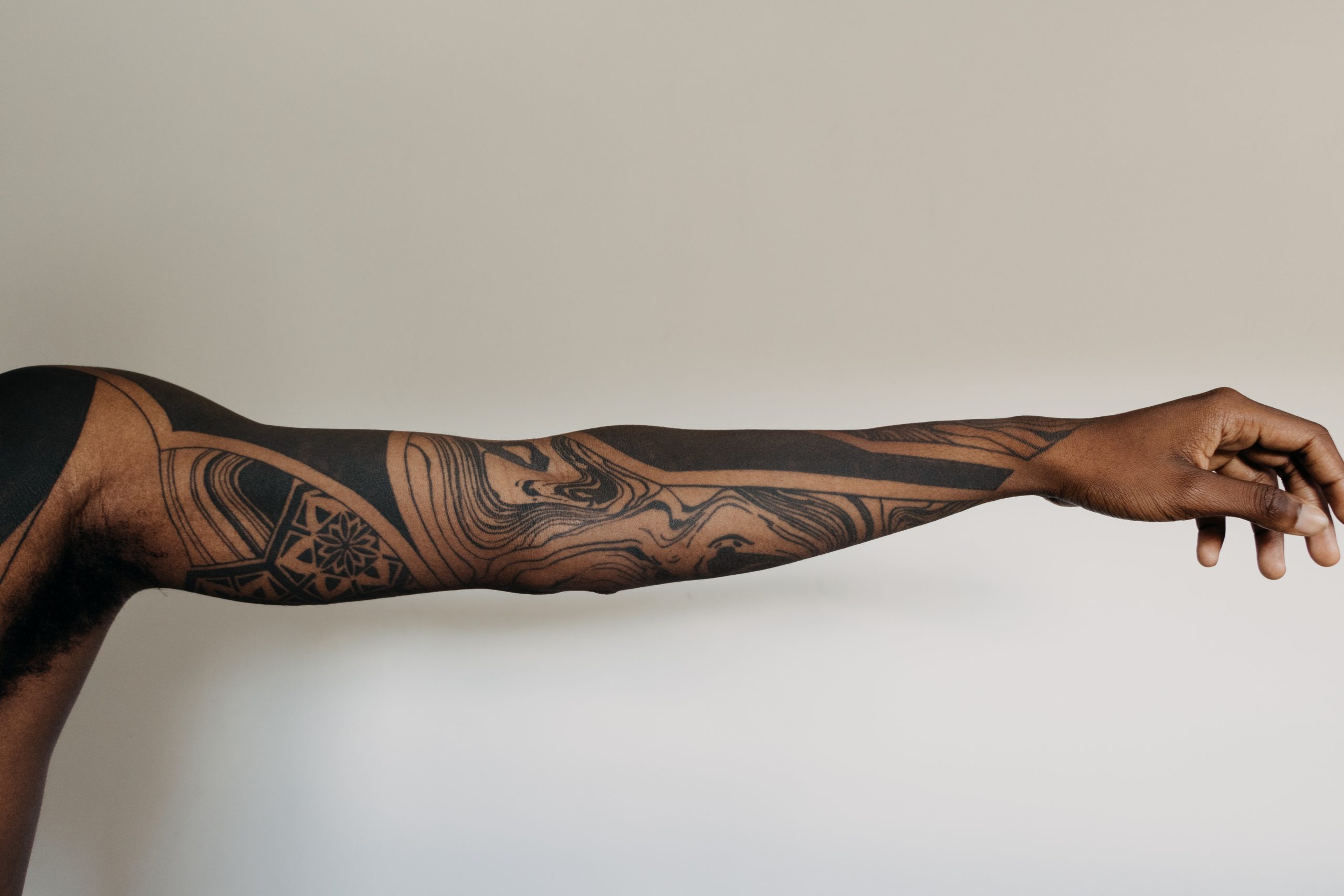 Accepting the Ink: Tattoos in the Workplace – Vanguard