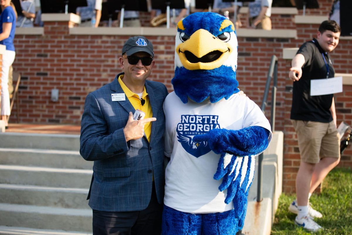 President Shannon poses with Nigel at the Fall 2023 Kickoff on the Dahlonega Campus. Photo by the University of North Georgia.