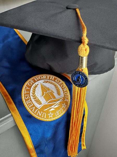 The University of North Georgia graduation cap and gown. Photograph by Lizzy Gordon
