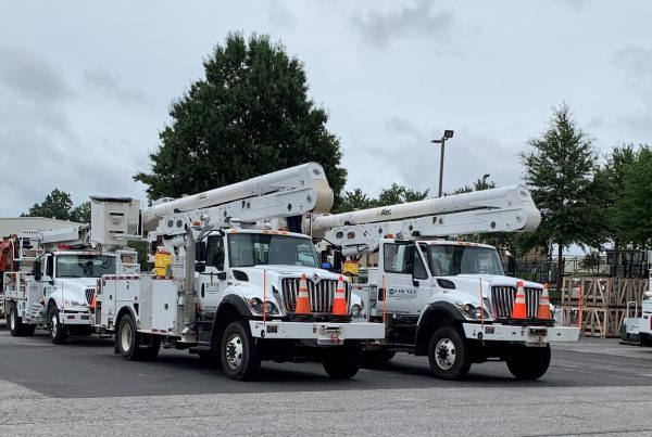 Two Sawnee EMC trucks sit beside each other ready to be deployed. Much of these saw use during the deep freeze in 2022 as power outages occurred throughout North Georgia.