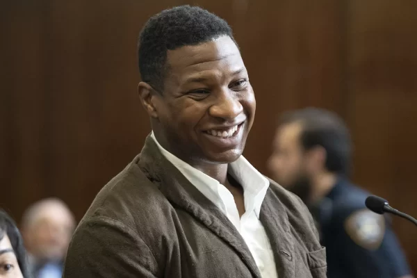 Television and Film star Jonathan Majors stands in a court room on Tuesday Jun. 20, to set his original trial date of Aug 3. The trial would be moved to Nov. 29 after multiple reschedules. (Photo byAP Photo/Steven Hirsh, Pool, People)