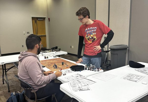 Members of the Guild of Tabletop Gamers playing a game. 