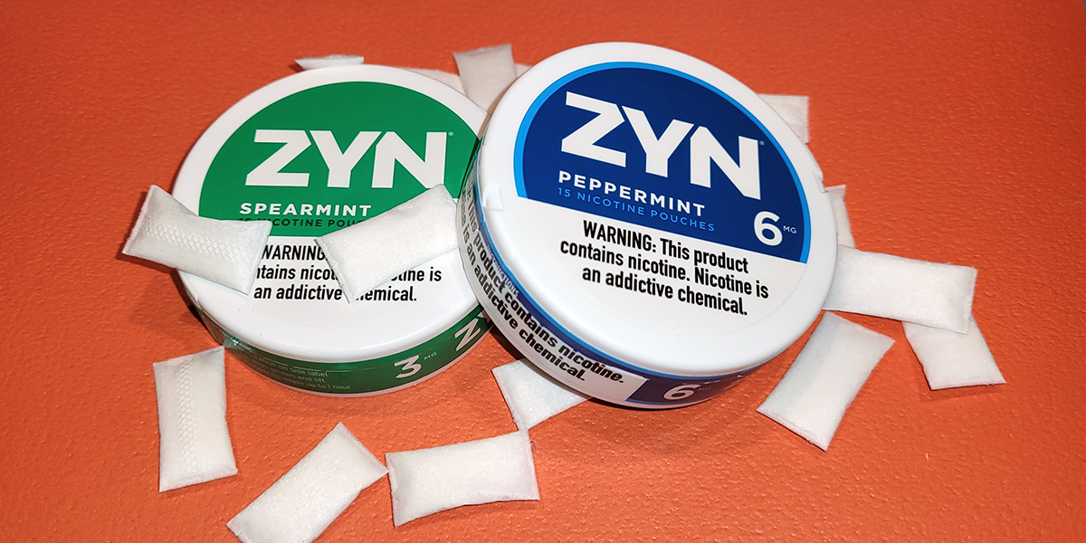 Two separate flavors of Zyn Pouches.