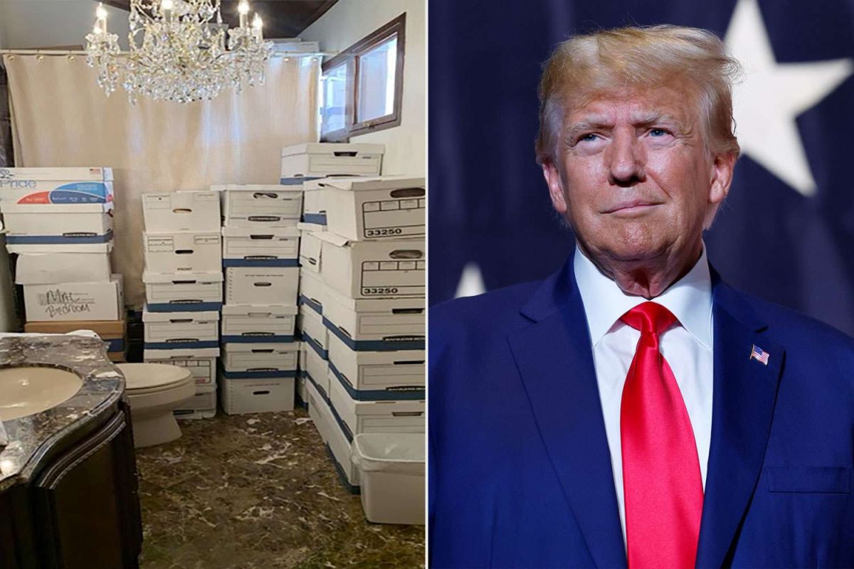 Boxes of classified documents held in bathroom with a chandelier.
