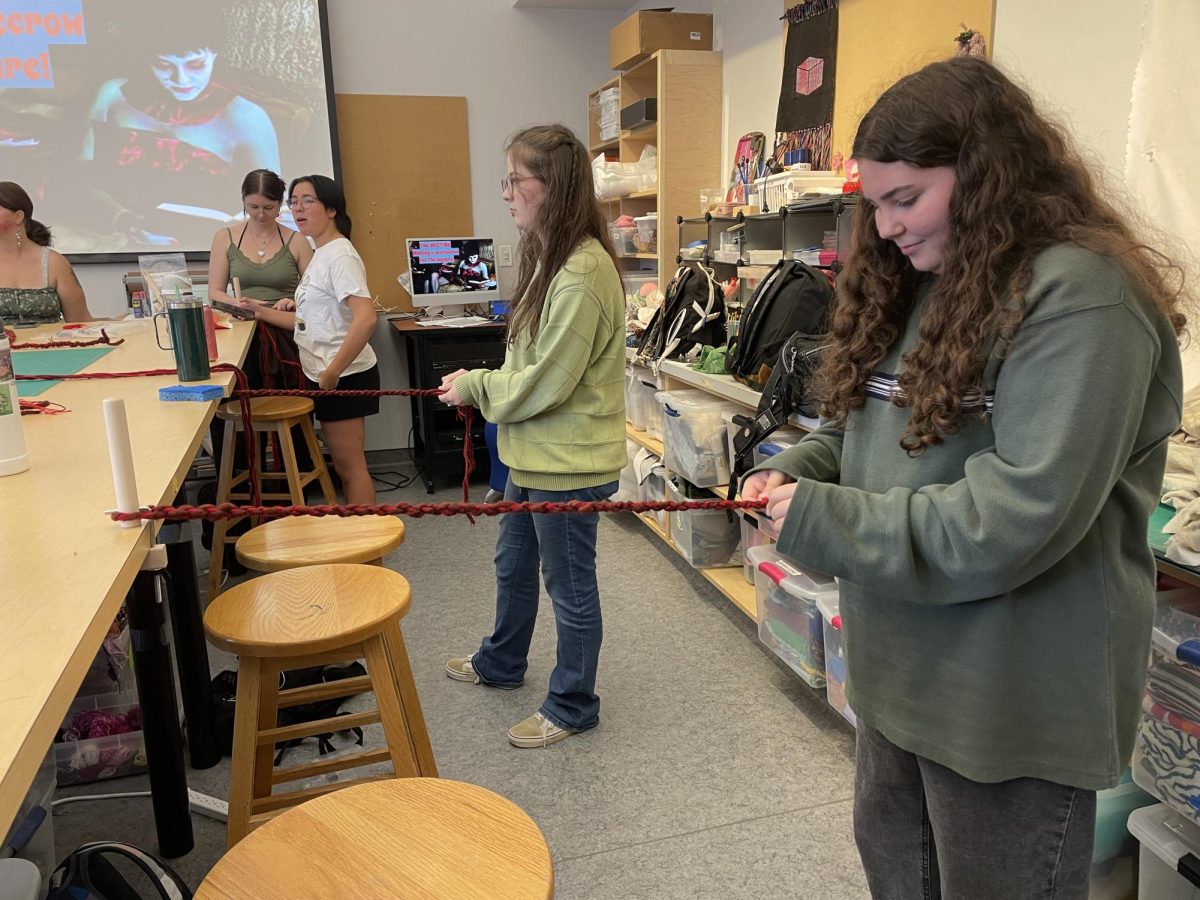 TAG attendees created rope by hand for their "Scares in the Square" scare crow. 