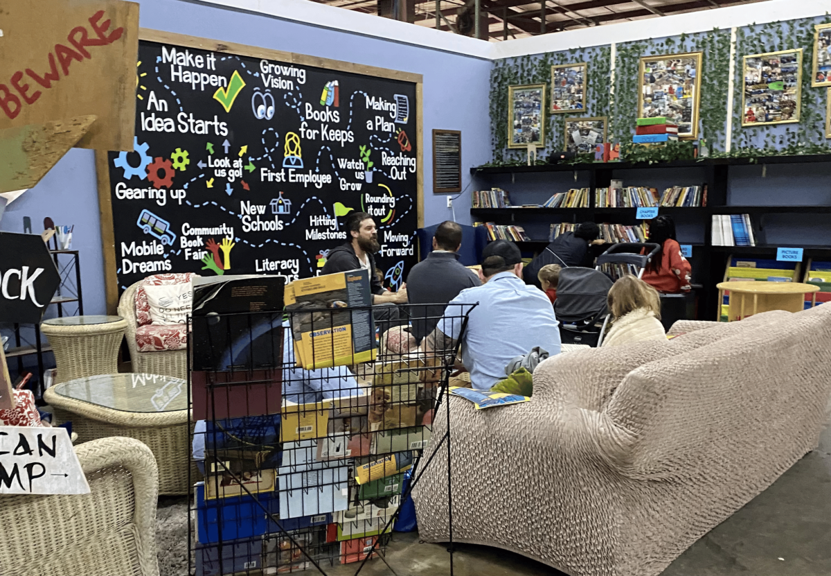 Visitors can read their new books at the festive seating area within the Books for Keeps warehouse. 