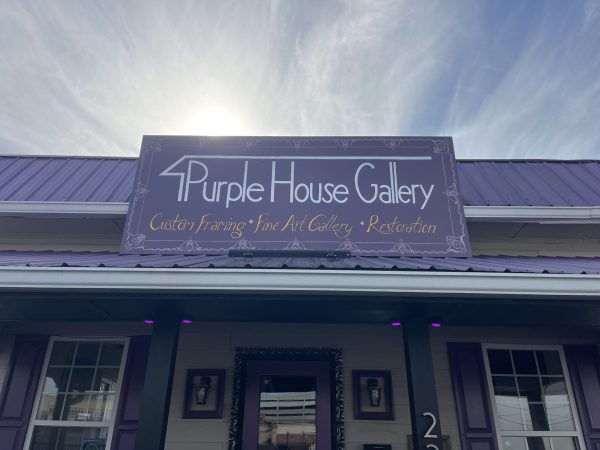 The Purple House Gallery is a center for art and expert framing. 