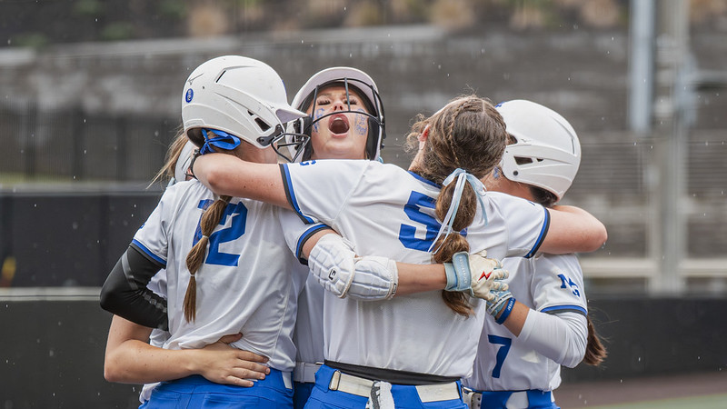 Sydnee Reaves and teammates celebrating her leadoff homerun against Lander in Peach Belt Conference Tournament. Photo by David Trotter.