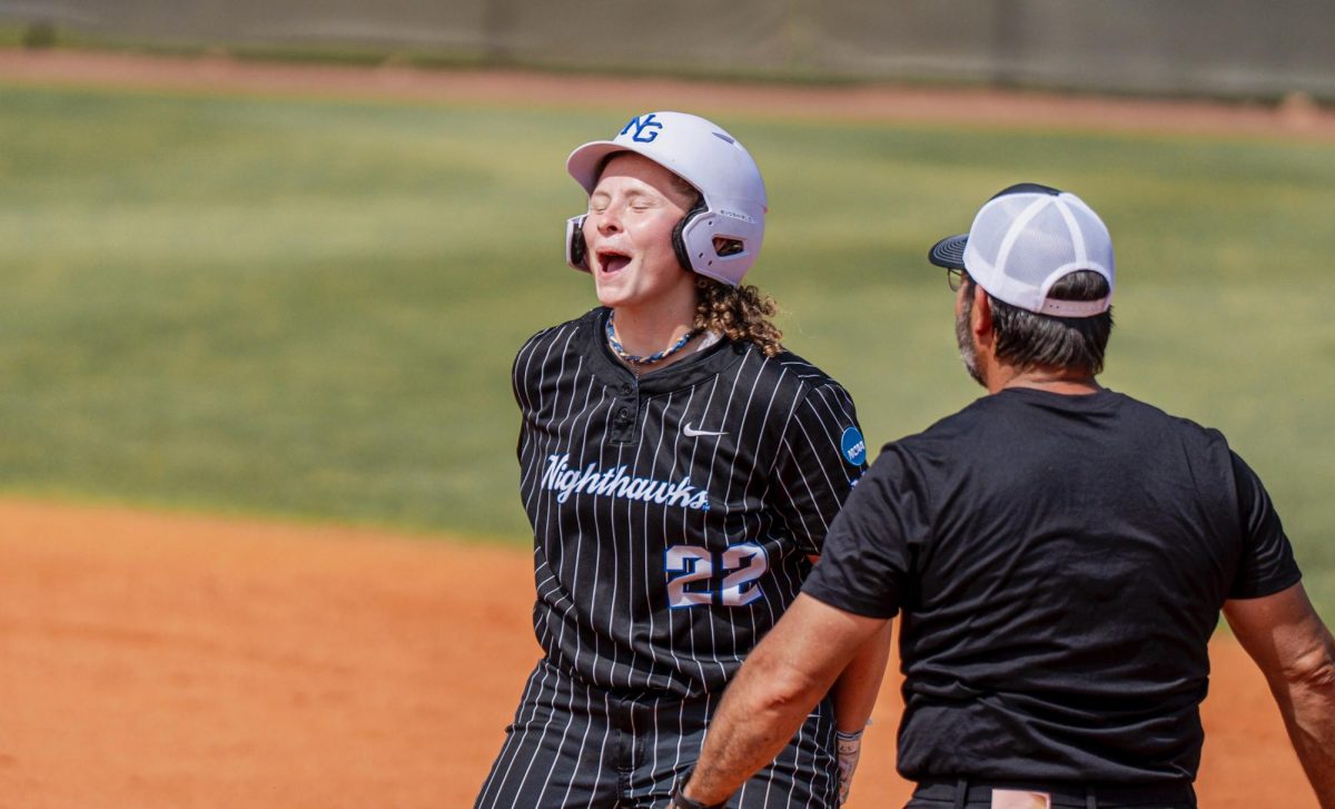 Marycille Brumby celebrating in what would become the game winning hit.