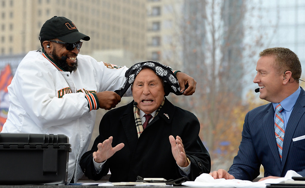 Celebrity guest picker and rapper Uncle Luke puts a bandana on Lee Corso during the 2017 ACC Championship game. Photo by Sara D. Davis.