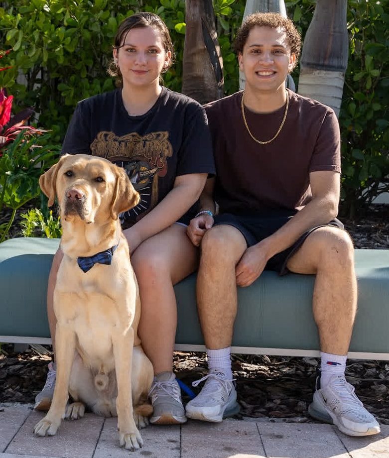 North Georgia K-9 Group co-founders Keirsten German (left) and Julian Buka (right) dropping off their first dog, Wesley, at "puppy college" in Florida.