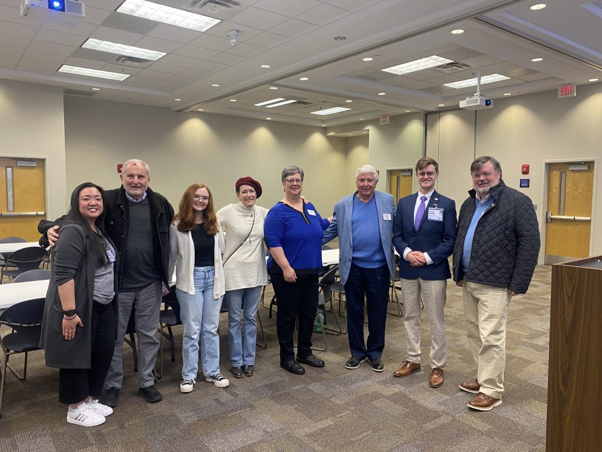 Professor Prater and student Robb Daniel stand with the board of Beyond Dementia Coalition.