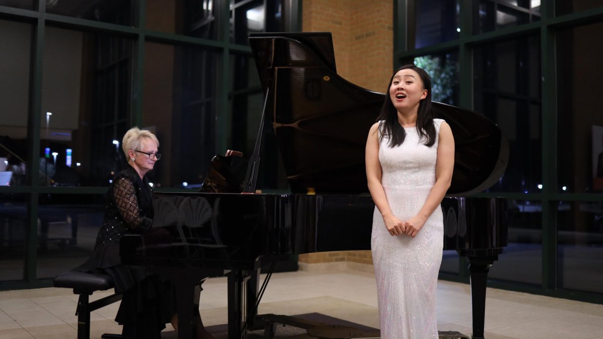 Vivian Doublestein (left) provided piano accompaniment for Yue Yin's (right) vocal performance on Monday night.